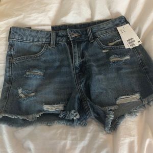 Summer staple! Comfy light dye cut offs.